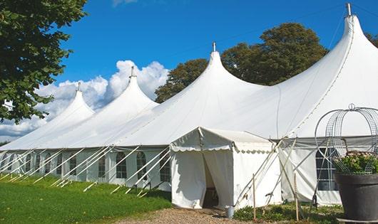 sleek white portable toilets for outdoor events, providing a reliable and functional option for those in need in Elsa